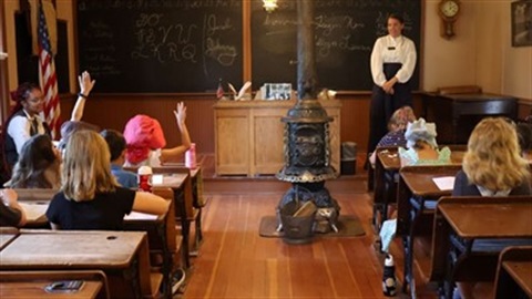 teacher teaching a classroom